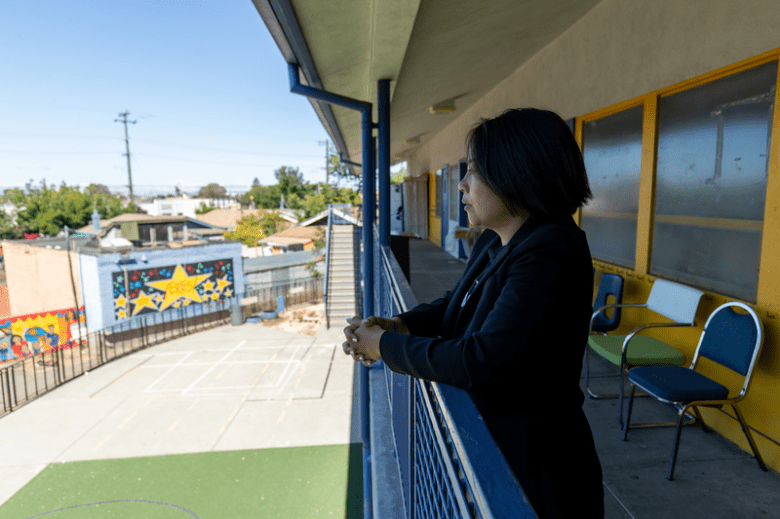 Aspire ERES principal overlooking school balcony